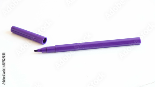 Purple felt-tip pen on a white background