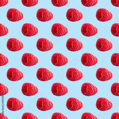 Seamless pattern with ripe raspberry. Berries abstract background. Raspberry pattern for package design with blue background.