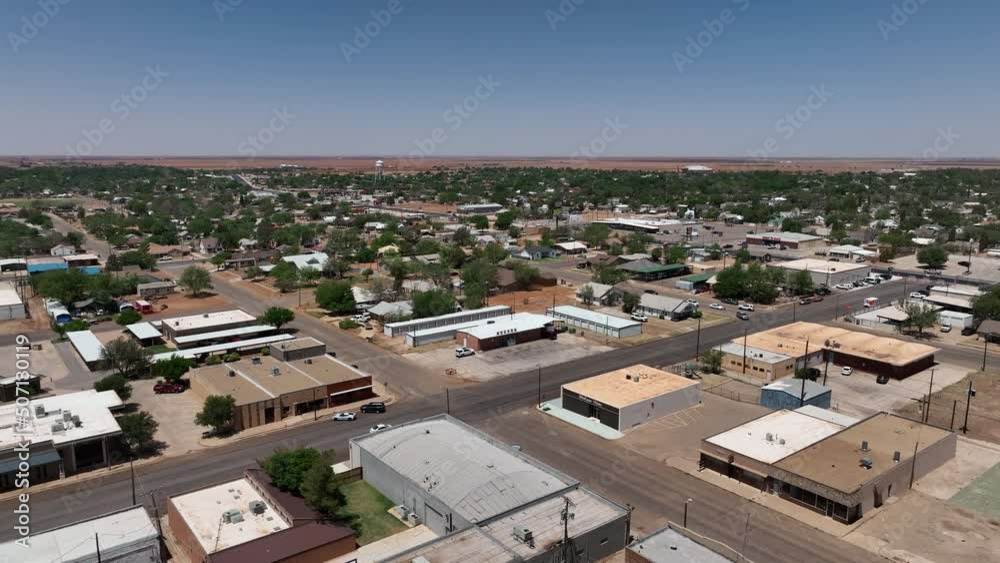 Aerial Lamesa Texas city business part 1 pull. Rural central Texas oil field town. County government. Old historic downtown, city square center town. Green trees in park. Business. Aerial Lamesa Texas city business part 1 pull. Rural central Texas oil field town. County government. Old historic downtown, city square center town. Green trees in park. Business.