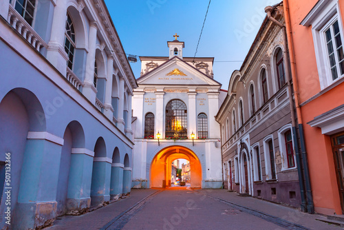Picturesque Street and Gate of Dawn Old Town of Vilnius, Lithuania, Baltic states. The inscription in Latin: Mother of mercy under your protection