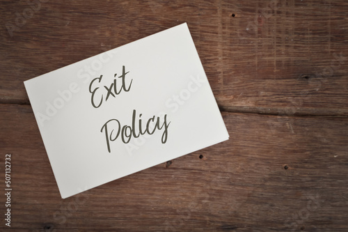 White paper written with text EXIT POLICY