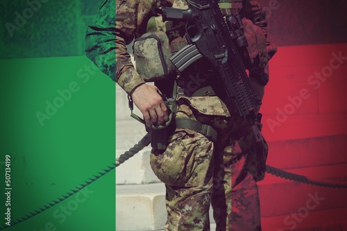 Italian flag with the Soldier as background , concept of Army . photo