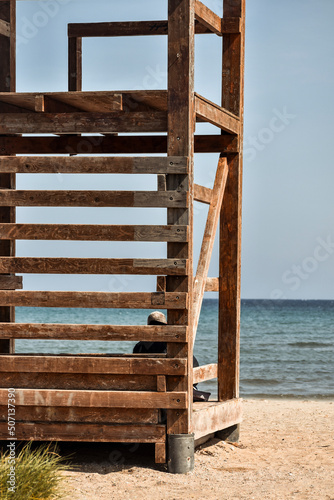 Lifeguard tower in Loutsa sandy beach  Artemida  in Athens  Greece  during sunny summer evening