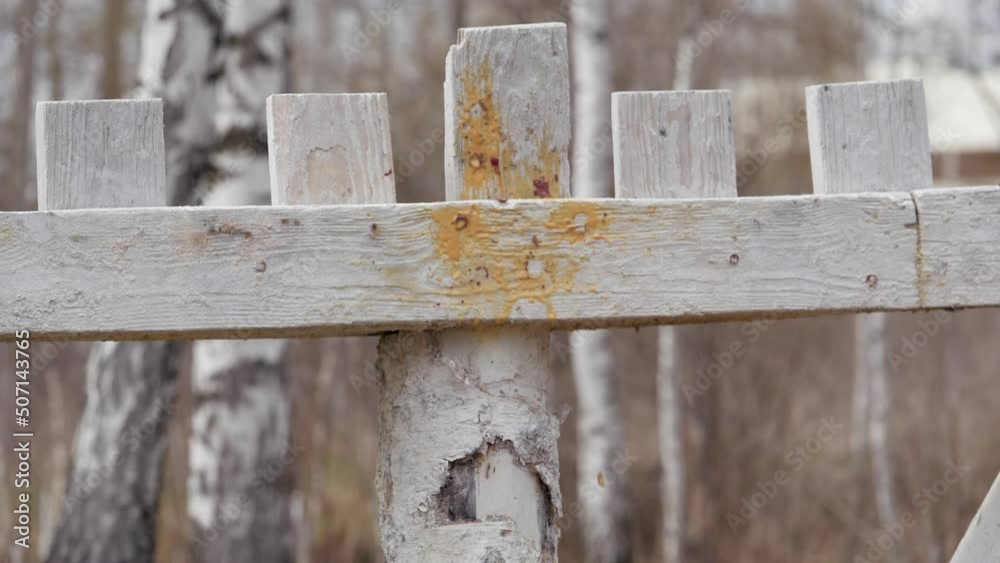 Paintball, paint balls fly away from the target. Wooden target. Paintball, paint balls fly away from the target. Wooden target.