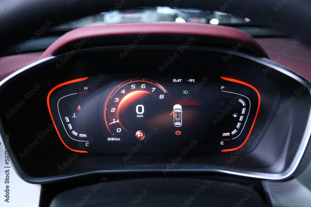 Digital instrument panel in a modern car. Meter of modern hybrid car, Air conditioning car, cockpit interior cabin details.