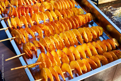 potatoes cut into a spiral and fried. tornado potato