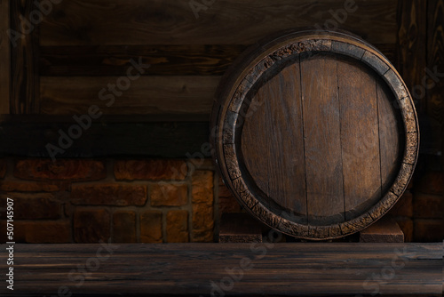 Rustic barrels for beverage in a dark wine cellar. Wooden empty surfaces for copy space  mockup  template for design of beer  wine  alcohol products  Vintage retro style background