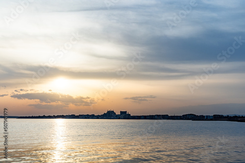 View of the reflection in the Black Sea against the background of the sky and sunset