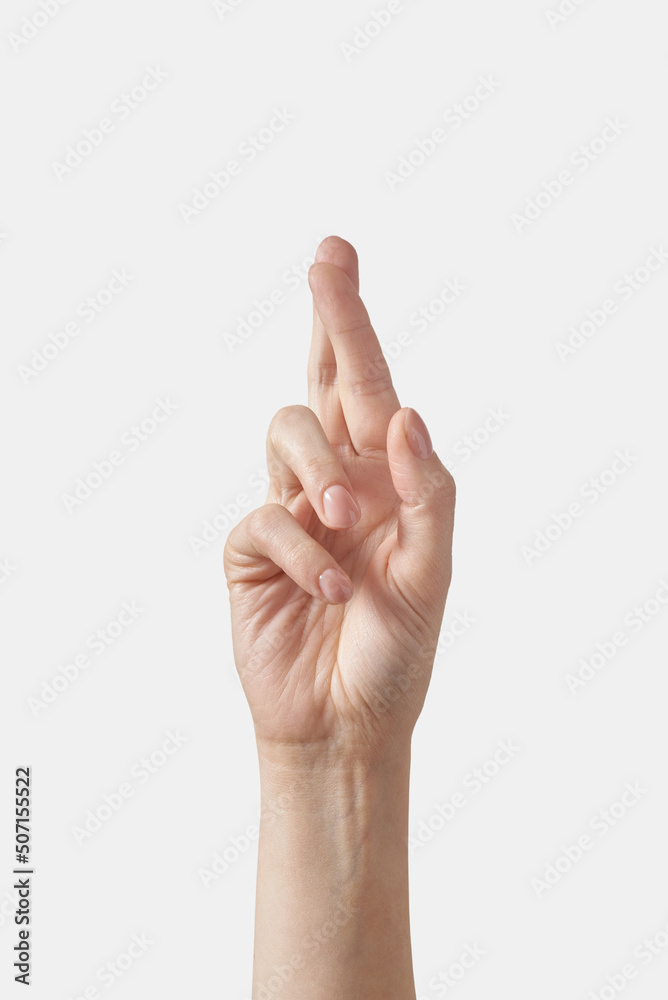 Female hand alphabet finger spelling R letter on white. Female hand alphabet finger spelling R letter on white.