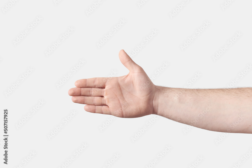 Close up handshake reaching male hand on white.