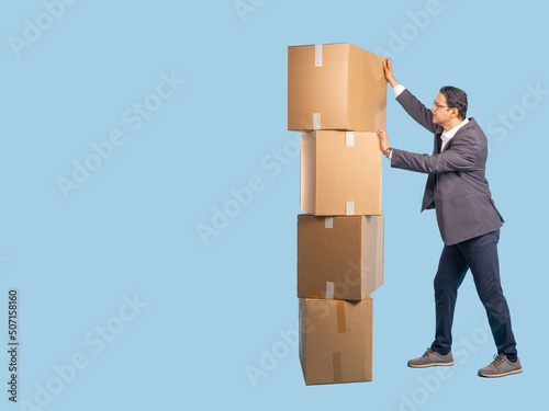 Businessman with boxes. Man...