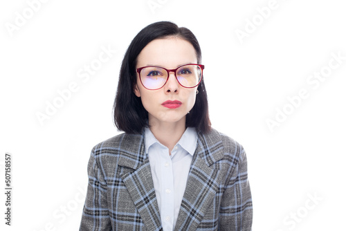strict female manager in a blue shirt, office suit and glasses, white studio background. High quality photo