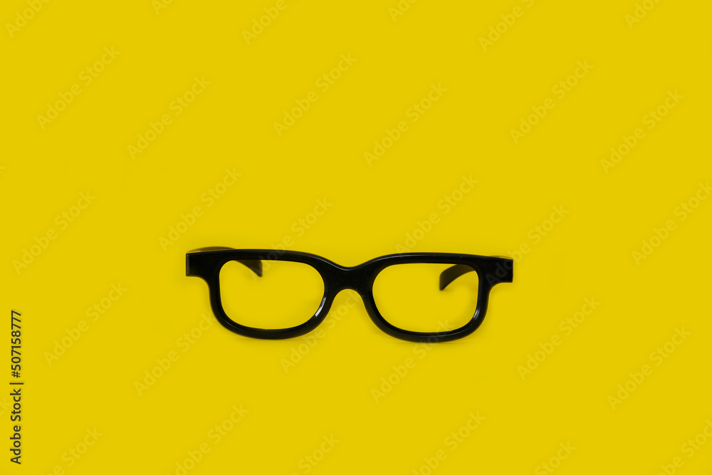 Glasses on a bright yellow background. Glasses on a bright yellow background.