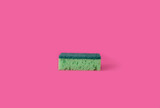 Sponges one for washing dishes on a bright pink background