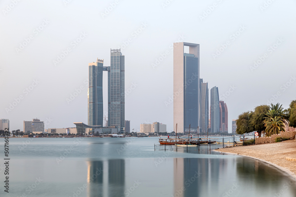 Naklejka premium Abu Dhabi skyline early morning. Establishing shot.