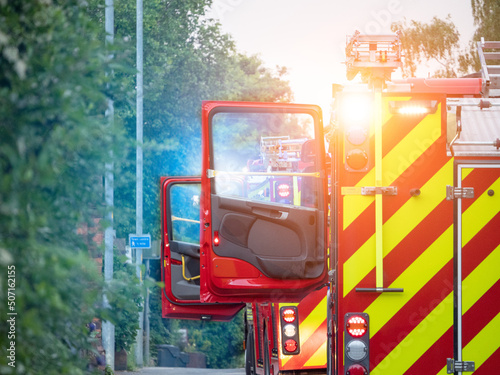 Bilde på lerret Pair of fire engine doors open at incident in England, UK, Flashing lights