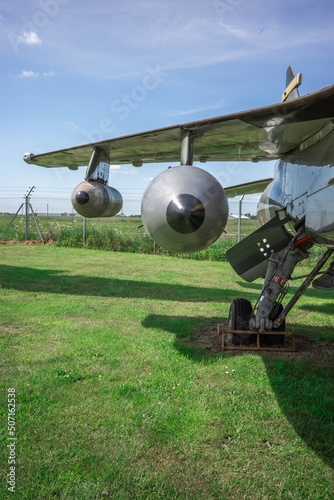 Norwich, Norfolk, UK – May 22 2022. Bombs and missiles attached the bottom of the wing of a Sepecat Jaguar military aeroplane photo