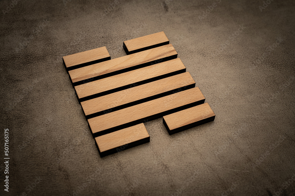 Gene Key 28 hexagram i ching wood on leather background human design Gene Key 28 hexagram i ching wood on leather background human design