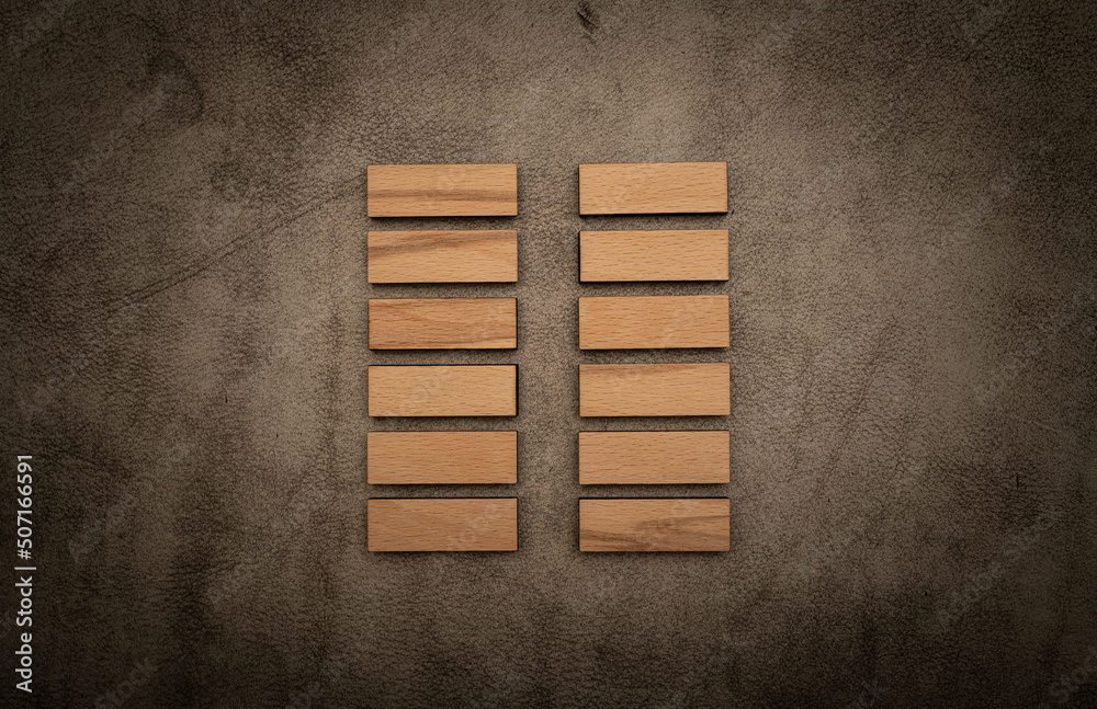 Gene Key 2 hexagram i ching wood on leather background human design Gene Key 2 hexagram i ching wood on leather background human design