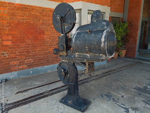 Old vintage 35mm film projector on display outside a former warehouse in Thessaloniki  Greece.