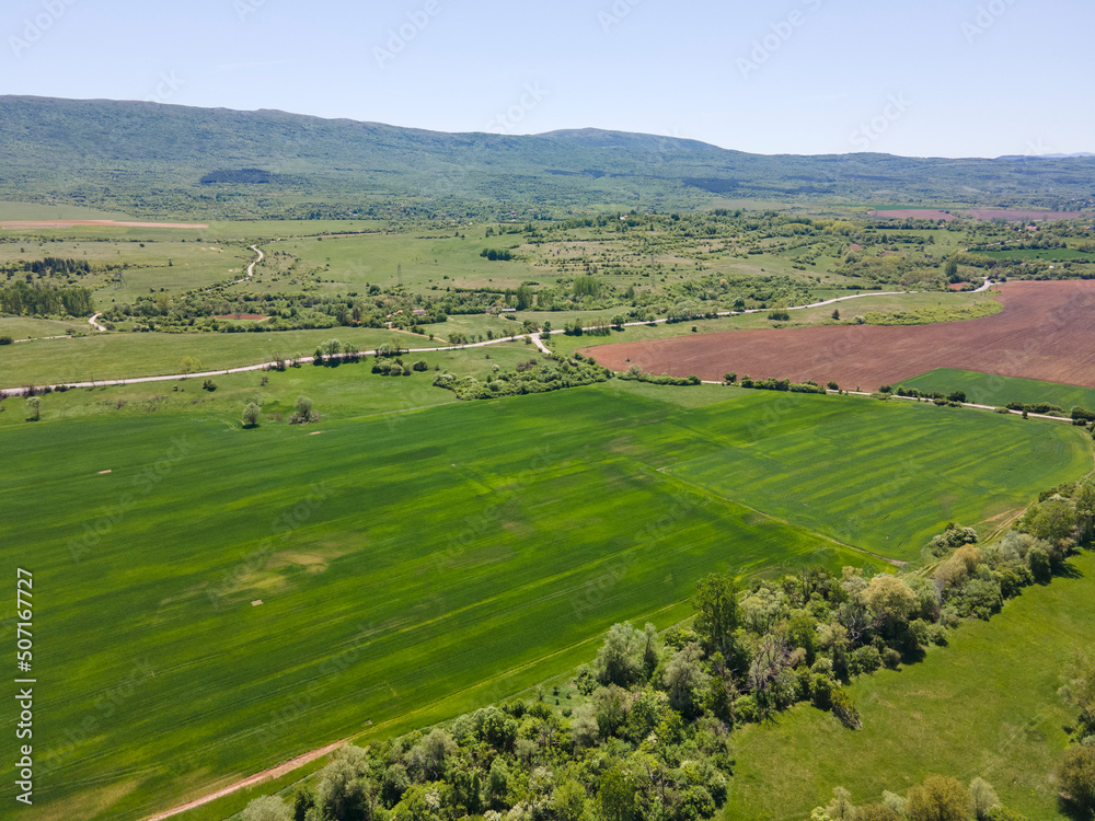 Fototapeta premium Spring Aerial view of rural land near town of Godech, Bulgaria