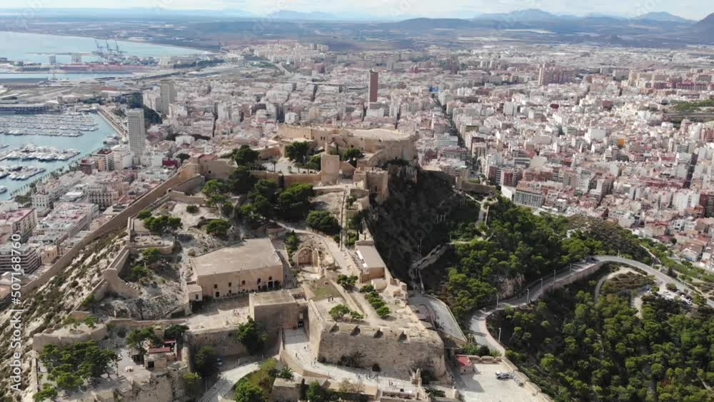 Panoramic Aerial View Of The Old Fortress On The Hill, The Port And The City Of Alicante, Spain Panoramic Aerial View Of The Old Fortress On The Hill, The Port And The City Of Alicante, Spain