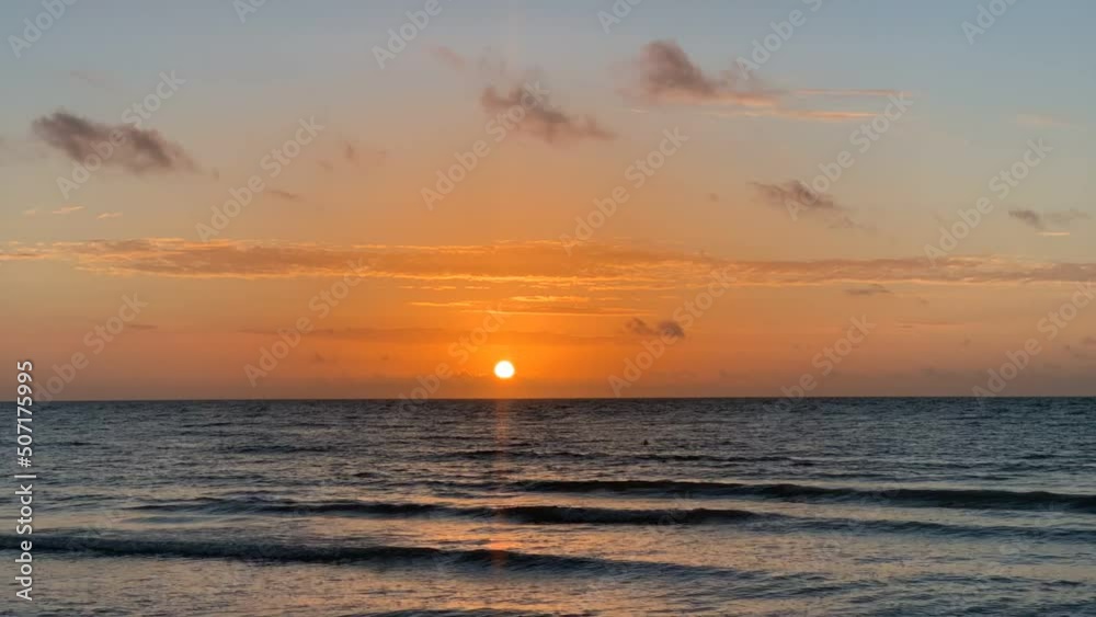 Time lapse of sunrise over the ocean at the beach in Key West, Florida Time lapse of sunrise over the ocean at the beach in Key West, Florida