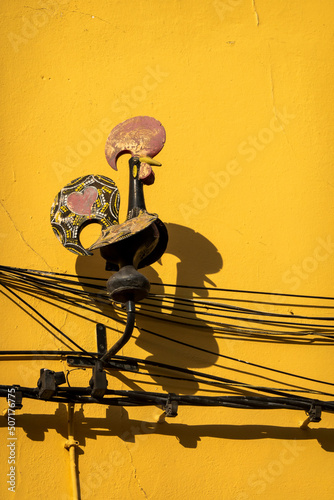 Wallpaper Mural Old worn figurine of Barcelos rooster Torontodigital.ca