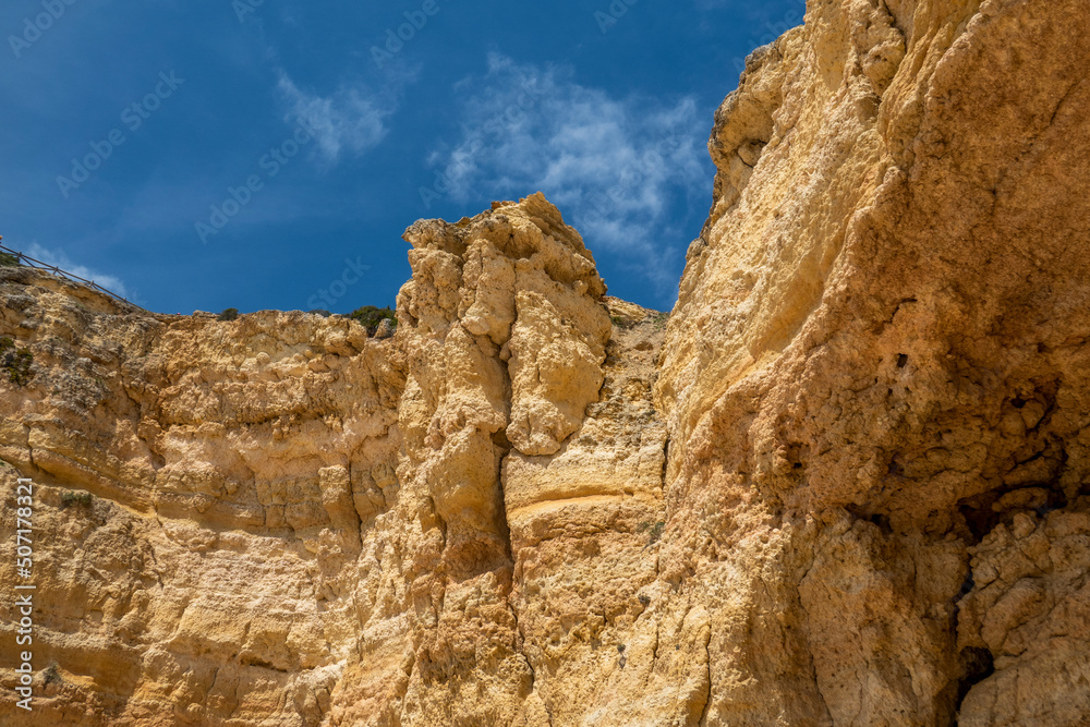 Natural sand formed by erosion of the elements