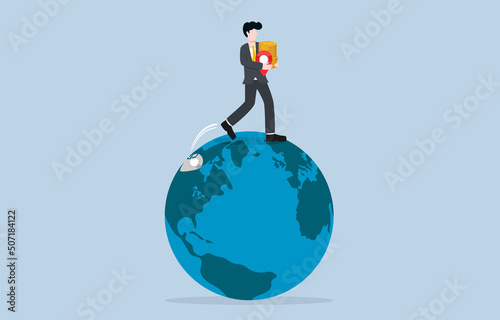 Relocating production or investment base due to 
high rate labour wage problem or cost reduction concept. Businessman entrepreneur carrying new pin and stack of coins moving to new location on globe.