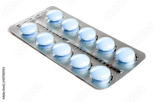 Konstfotografi Pack of blue tablets isolated on white background.