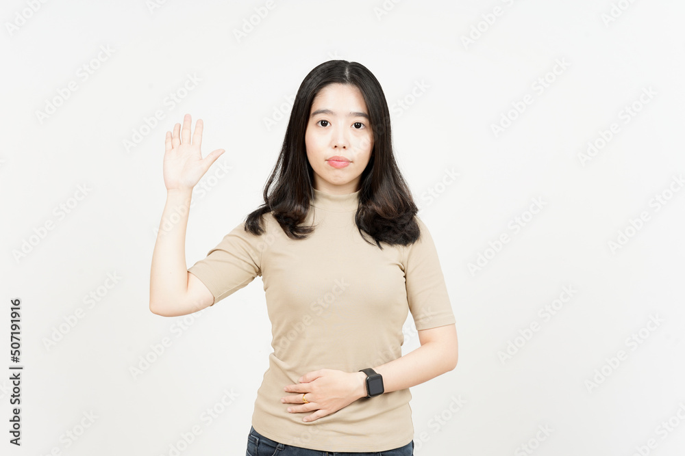 Swearing or Promise Gesture Of Beautiful Asian Woman Isolated On White Background Swearing or Promise Gesture Of Beautiful Asian Woman Isolated On White Background