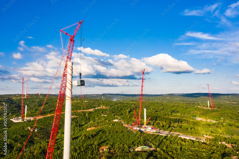 Installing of wind turbine tower with construction crane, Power plant ...
