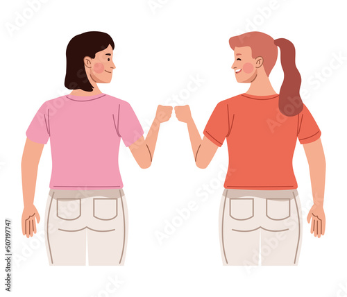 female friends bumping fists