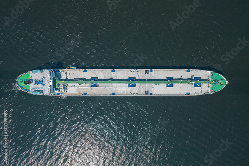 Cargo Ship docked at open sea close to harbour. Drone aerial bird eye view © Quatrox Production