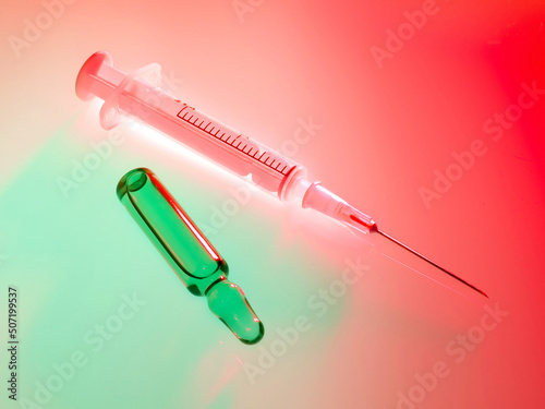 Ampula and syringe. photo