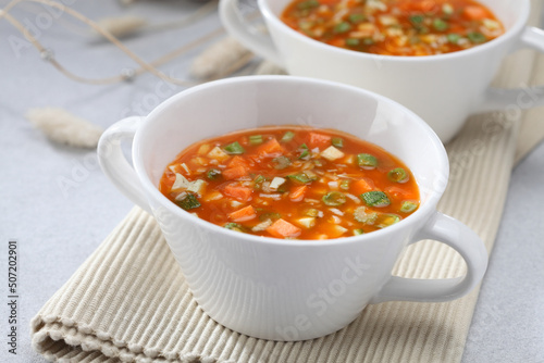 Minestrone Milanese Soup in a white ceramic bowl.