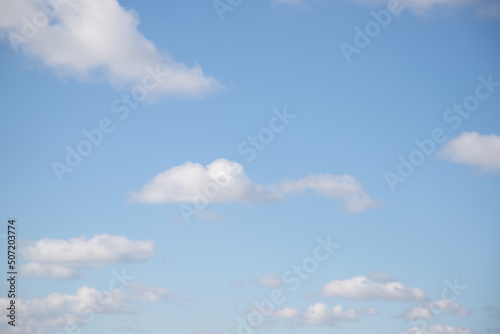 beautiful white clouds against the blue sky