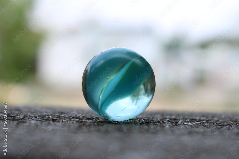 t is a glass marble, It s a traditional Korean game, children toy t is a glass marble, It s a traditional Korean game, children toy