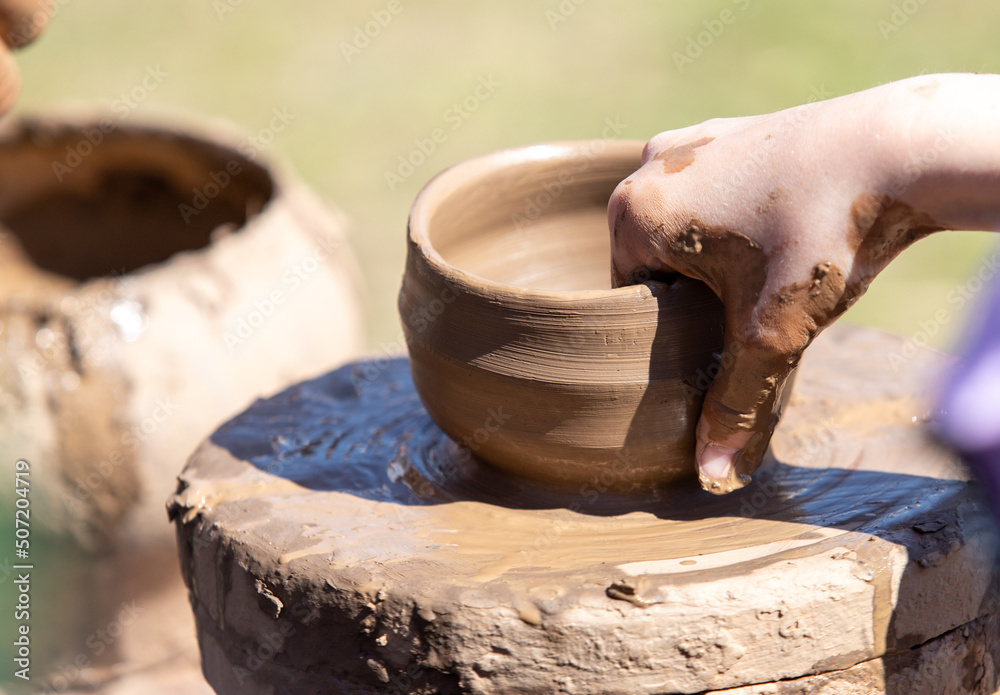 making pottery from clay