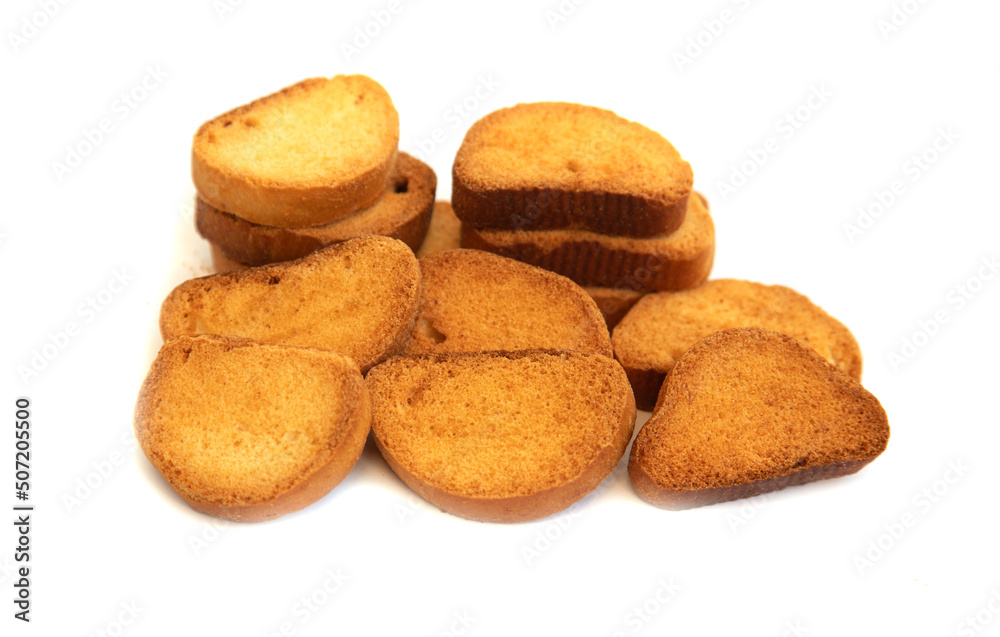 Dried fried bread slices on white background