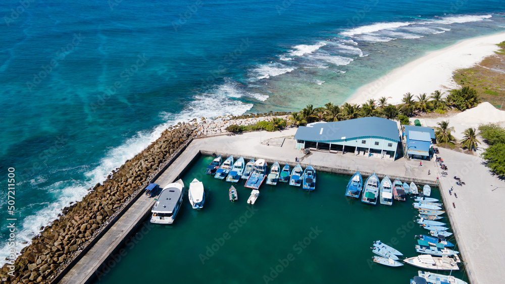Aerial view of boat jetty at Fuvahmulah Harbour, fishing port and famous dive site for tiger sharks, Fuvahmulah Island, Gnaviyani Atoll or Nyaviyani Atoll, Maldives