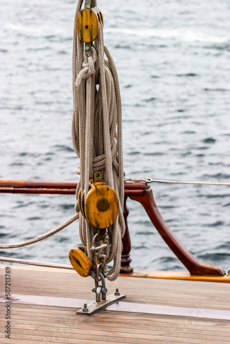Blocks and tackles with ropes on a boat photo
