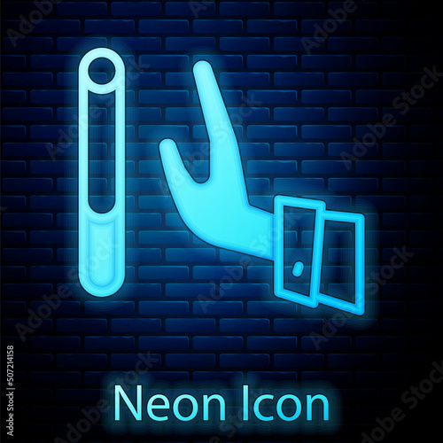 Glowing neon Giving up cigarette icon isolated on brick wall background. Tobacco sign. Smoking symbol. Healthy lifestyle. Vector
