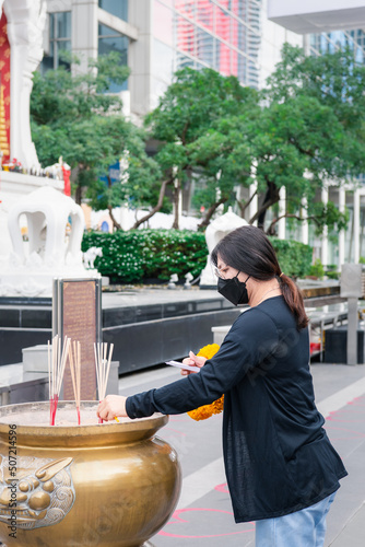 Thai buddhism pray for benefaction worship