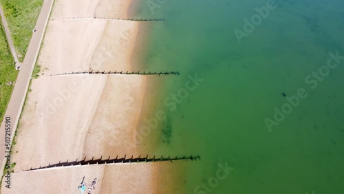 A fast aerial birds-eye-view flyover of Tankerton beach. photo