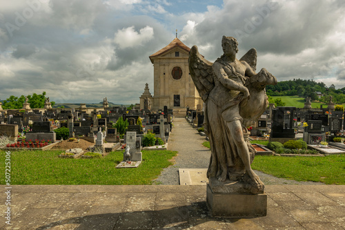 Landscape view on the protectec baroque cemetery of Strilky village from Czech Republic photo