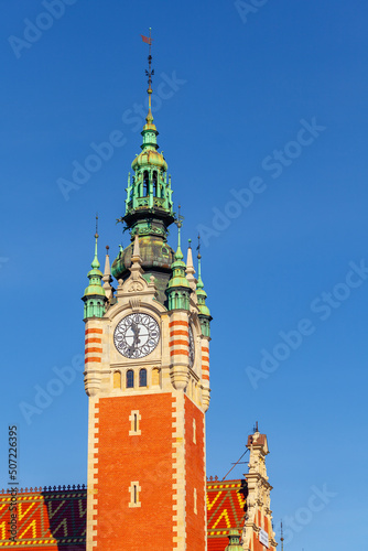 Gdansk Glowny is the historic exterior of main railway station with clock tower, Poland