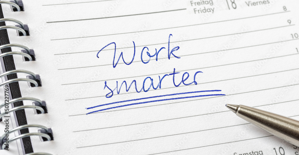 Work smarter written on a calendar page Work smarter written on a calendar page