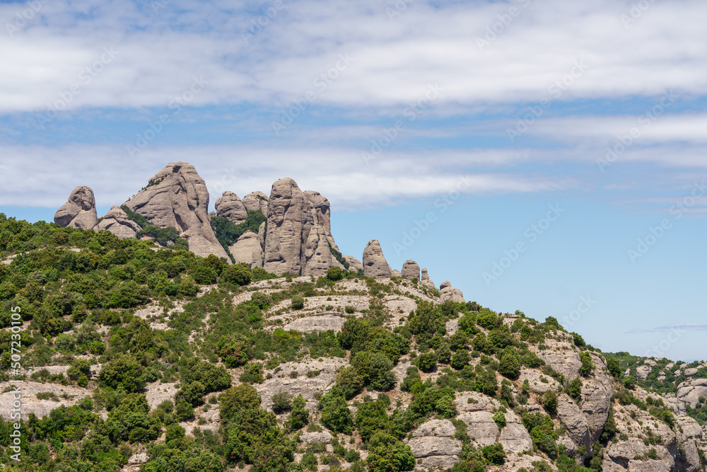 Abbey of Santa Maria de Montserrat in Monistrol, on a beautiful spring day, Catalonia, Spain. Very close to Barcelona is one of the most magical places in Catalonia.